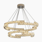 Two interlocking spiral crystal rings with stainless steel LED, suspended by slim black wires.