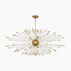 Gold and glass dandelion chandelier with radiant rods, central sphere, and modern LED illumination.