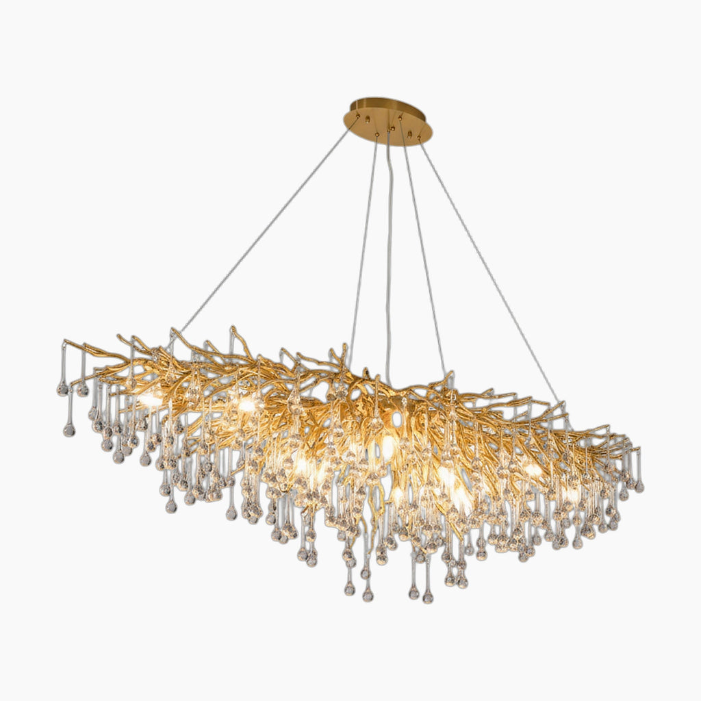 Tree-like LED crystal chandelier with clustered bulbs and droplets, suspended by four wires, semi-flush mount.