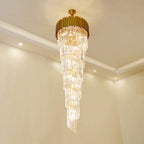 Maison Ornate LED Crystal Chandelier features cascading glass rods and gold accents for modern elegance.