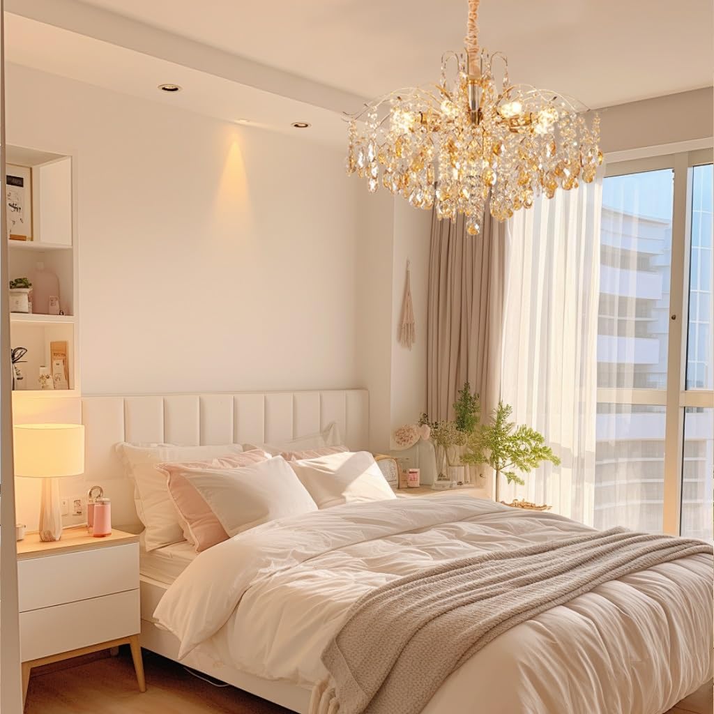 Maison Ornate Elegant Crystal Chandelier with Gold Tassels, sparkling in natural sunlight overhead.