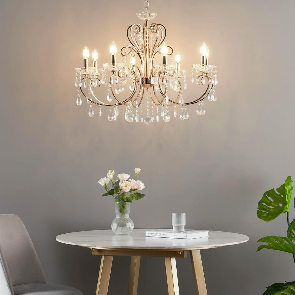 The Maison Ornate Rose Gold Baroque Crystal Chandelier with 8 arms and E14 sockets glows elegantly.