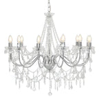 Eight-light baroque chandelier with silver arms, acrylic pearl accents, and chain suspension.