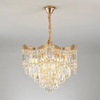 Tiered gold chandelier with cascading K9 crystals, adjustable height, and warm LED illumination.