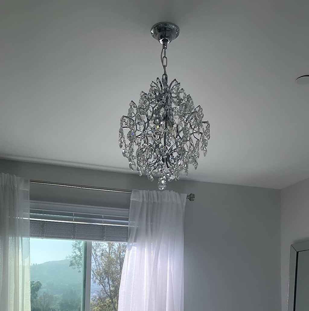 Maison Ornate Crystal Ball Chandelier with three elegant drop shades, suspended from a white ceiling.