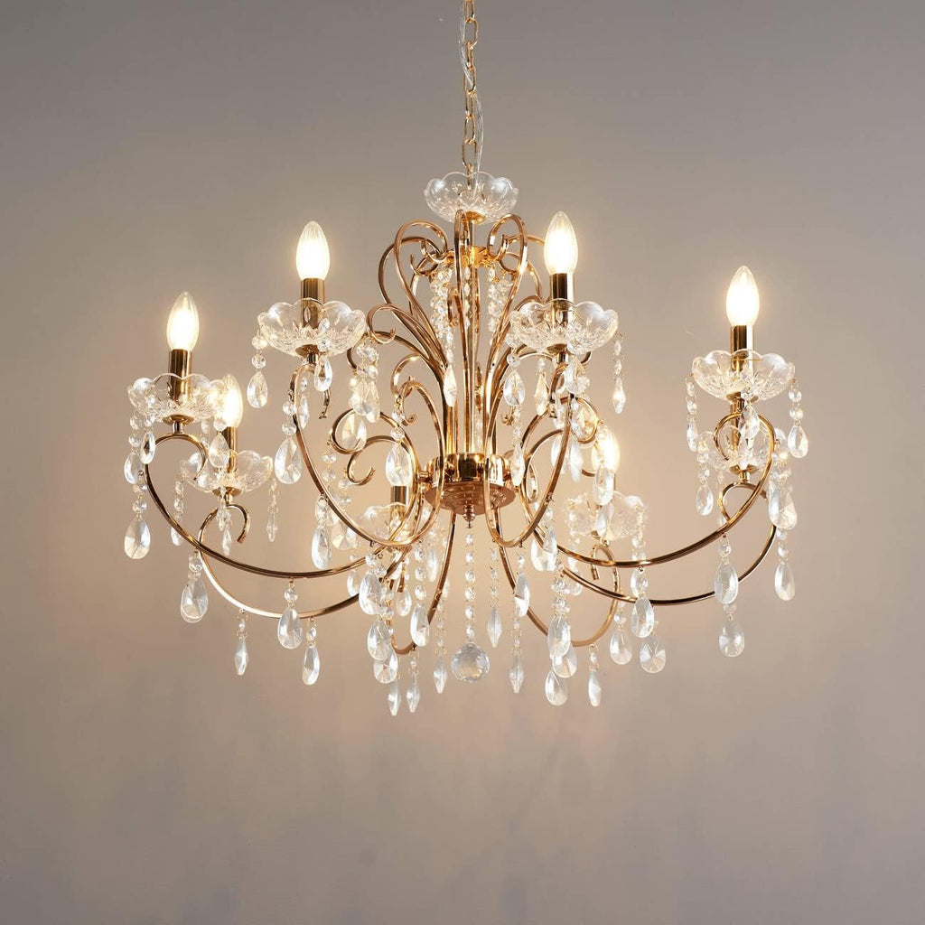 Maison Ornate Rose Gold Baroque Chandelier with 8 candle arms and crystal ornaments.