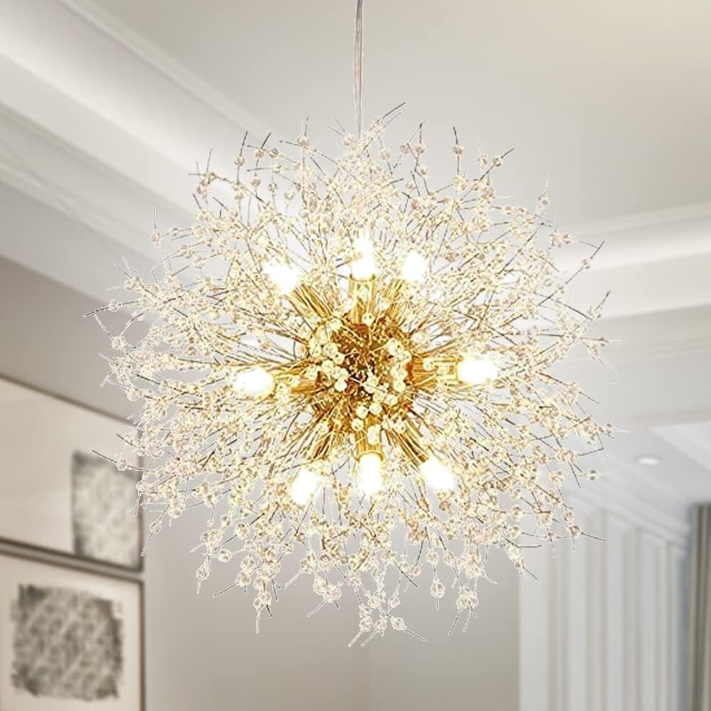 Modern gold dandelion chandelier with crystal balls and glowing bulbs in an ornate design.
