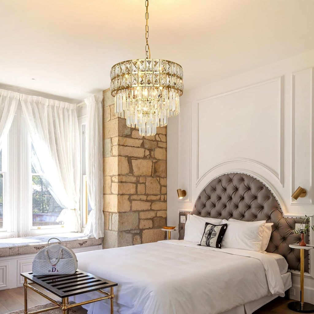 Maison Ornate Gold Stainless Steel Modern Crystal Chandelier gleams with intricate gold details and cascading crystals.