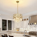 Maison Ornate Gold Stainless Steel Modern Crystal Chandelier hangs elegantly with sparkling details.