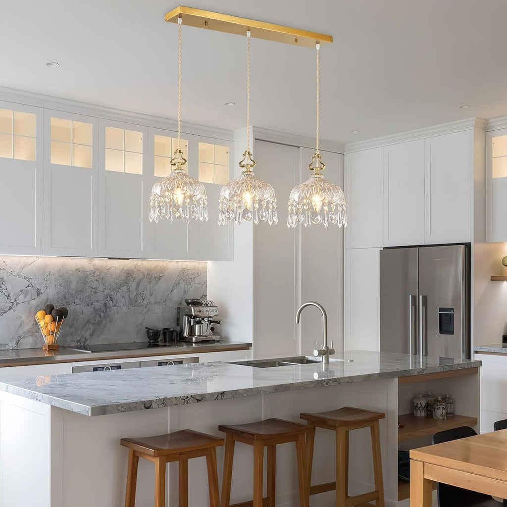 Elegant Adjustable Brass Crystal Pendant Light by Maison Ornate, suspended, showcasing refined crystal detailing.