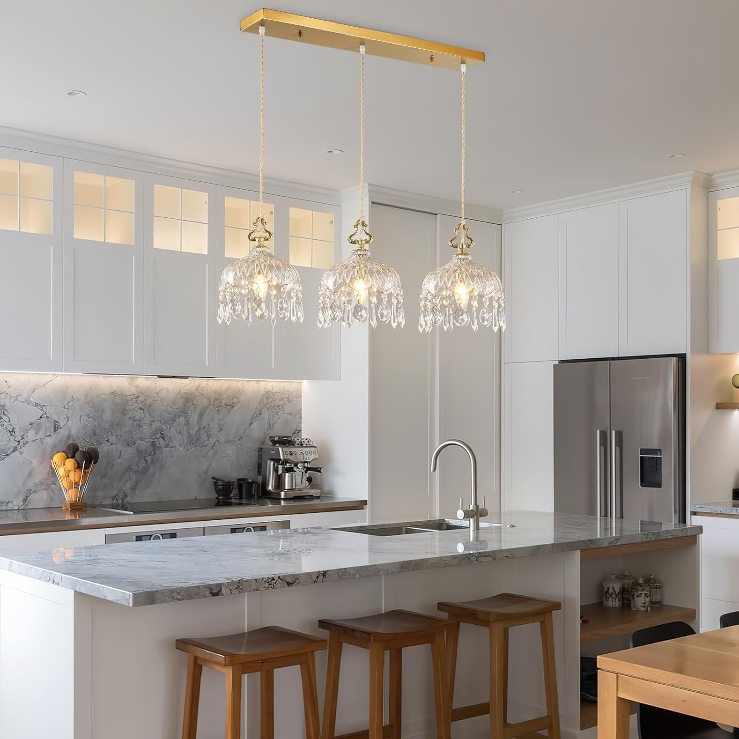 Elegant Adjustable Brass Crystal Pendant Light by Maison Ornate, suspended, showcasing refined crystal detailing.