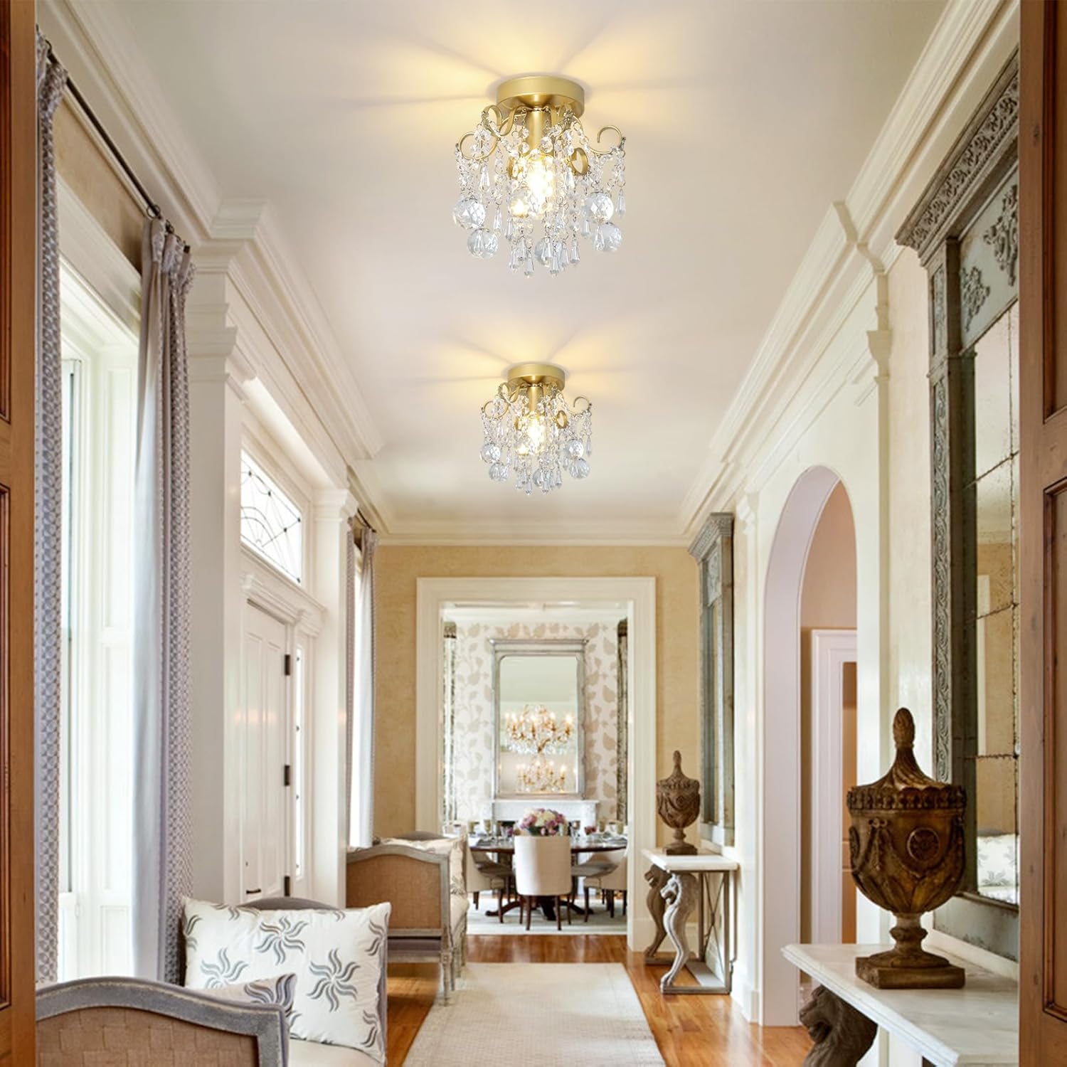 Two Maison Ornate Modern Crystal Ball Chandeliers with gleaming spheres suspended from elegant metal fixtures.