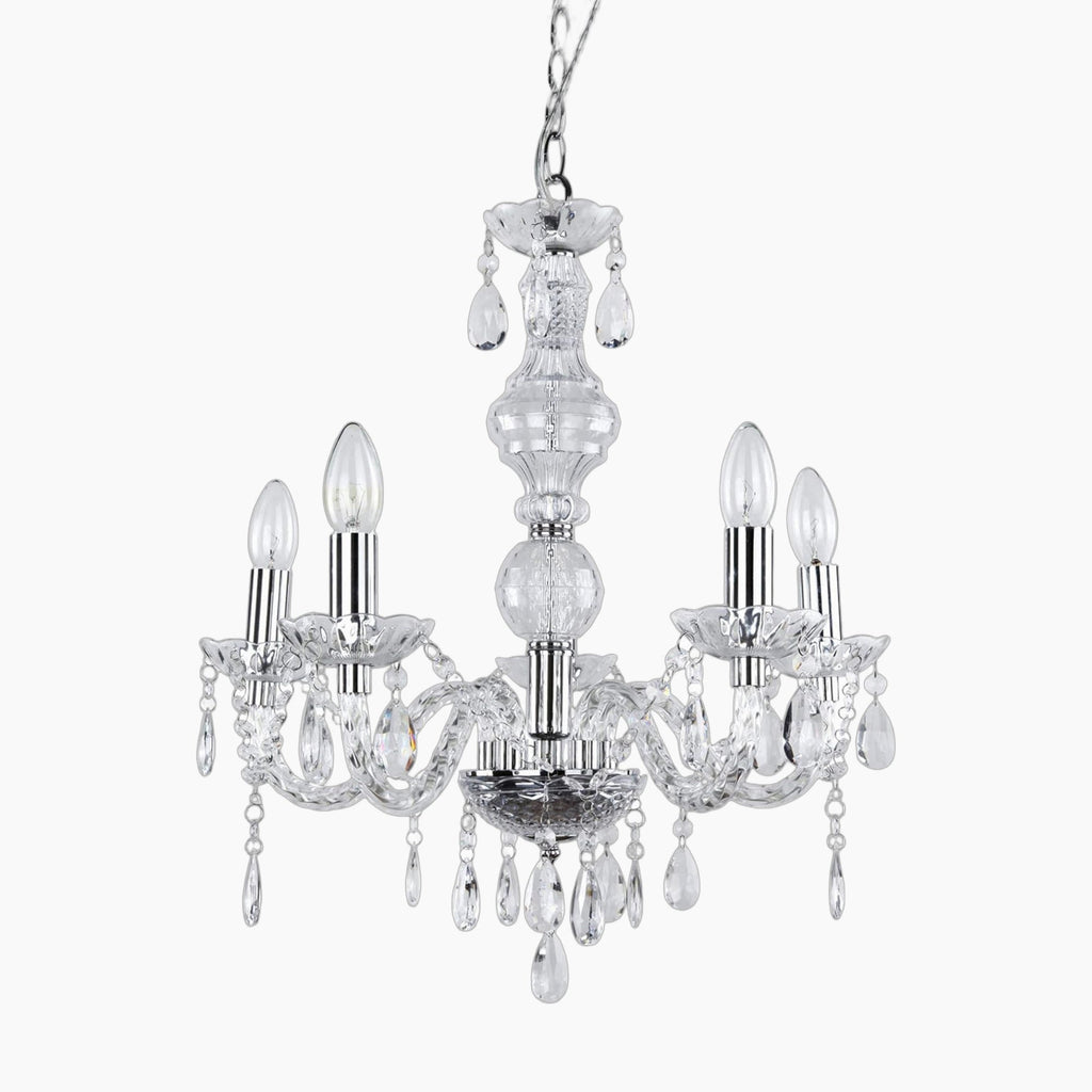 Ornate vintage crystal chandelier with five candle bulbs, chrome finish, glass arms, and acrylic pendants.