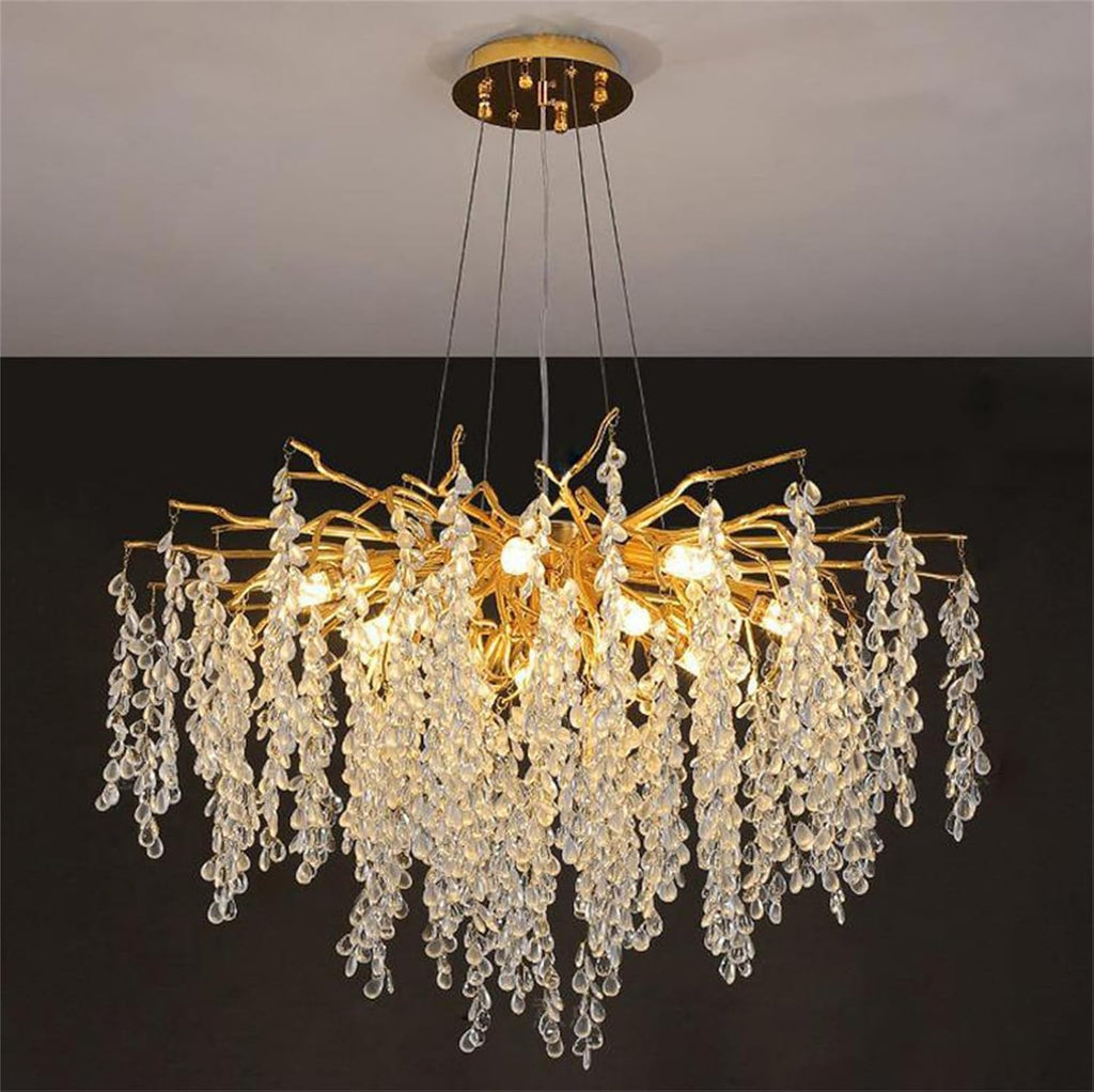 Modern crystal gold branch chandelier with cascading crystals; elegant, ornate, and luxurious lighting statement.