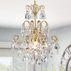 Maison Ornate Modern Gold 5-Light Crystal Ball Chandelier features crystal prisms and elegant gold accents.