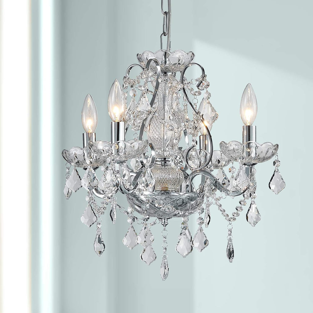 The Maison Ornate Modern Chrome chandelier features 4 lights, ornate metal arms, and crystal pendants.