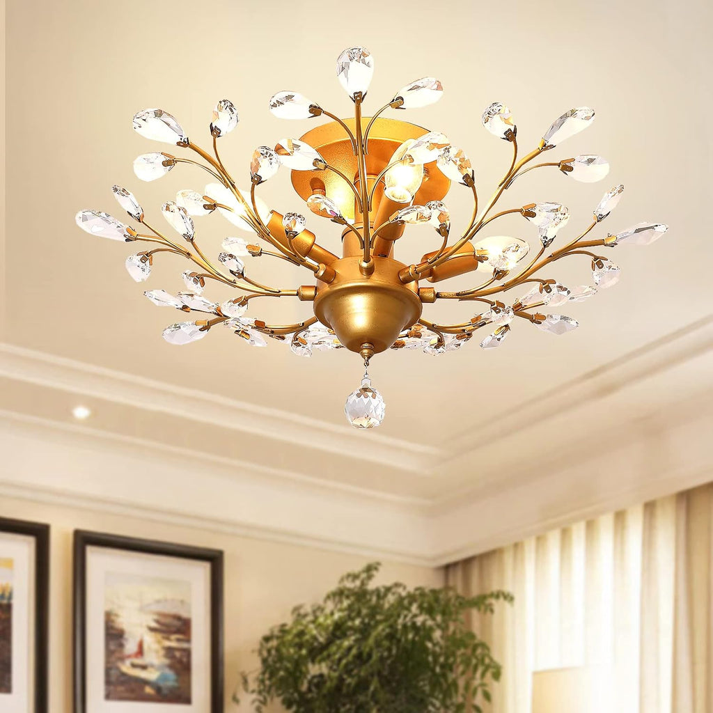 Maison Ornate K9 Crystal Chandelier with gold, black, and silver arms and crystal droplets.
