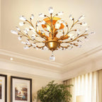 Maison Ornate K9 Crystal Chandelier with gold, black, and silver arms and crystal droplets.