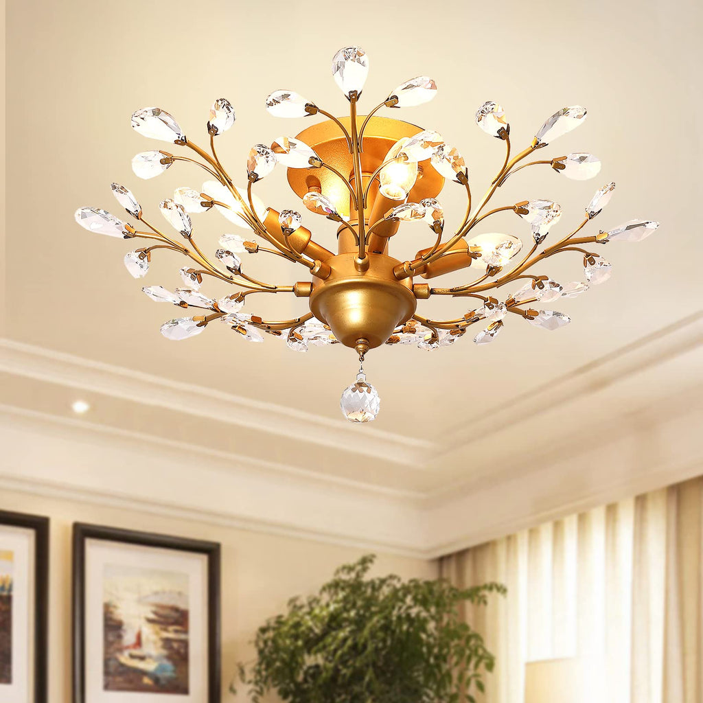 Maison Ornate K9 Crystal Chandelier in Gold, Black, and Silver with crystal-like branches and leaves.