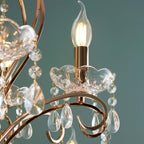 Maison Ornate Rose Gold Baroque Chandelier with 15 arms, crystal droplets, and candle bulbs.