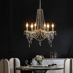 The Maison Ornate Modern Metal Crystal Chandelier features intricate crystal details and sleek metal accents.