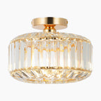 Gold-framed modern crystal chandelier with E27 base and vertical clear crystal cylindrical shade.