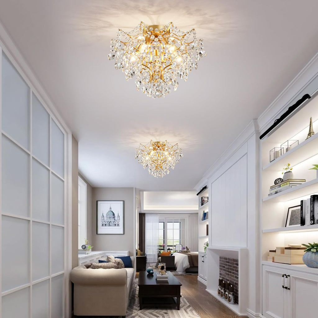 Two Maison Ornate Modern Gold 5-Light Crystal Ball Chandeliers with intricate crystal detailing.