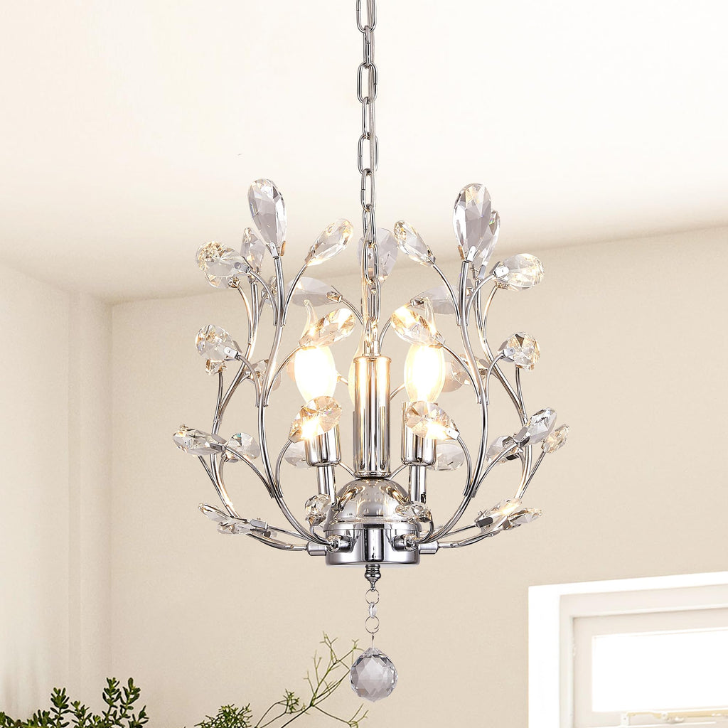 Gold, black, and silver vintage chandelier with three exposed bulbs and ornate crystal-embellished branches.