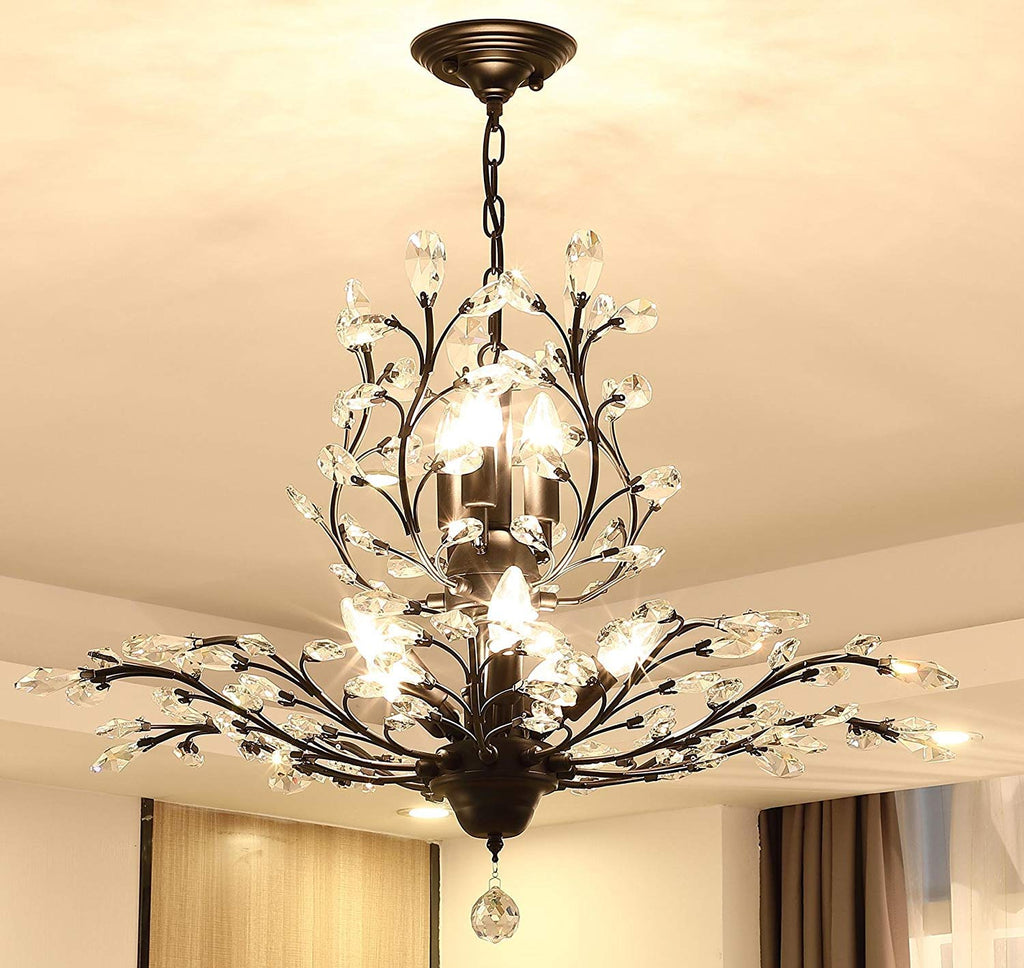 Maison Ornate K9 Crystal Chandelier in gold, black, and silver with crystal leaves and exposed E14 bulbs.