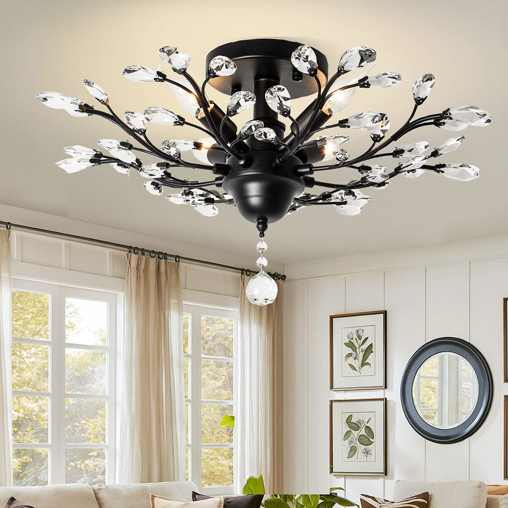 Maison Ornate K9 Crystal Chandelier in gold, black, and silver with clear leaf crystals.