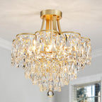 Maison Ornate Modern Gold 5-Light Chandelier with layered crystal prisms and warm lights.