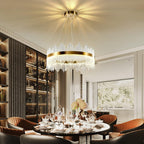 Maison Ornate Golden Crystal Round Modern Adjustable LED Pendant chandelier, casting elegant, soft ambient light.