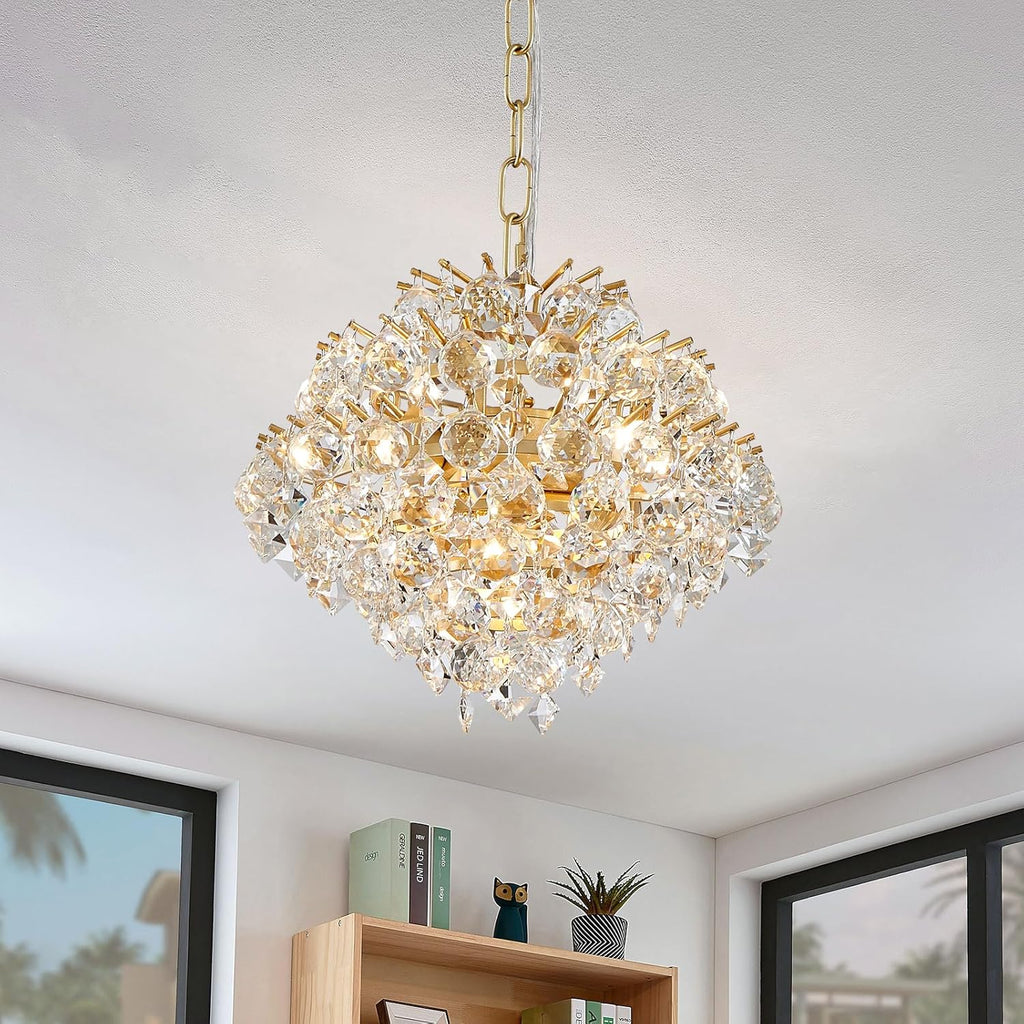 The Maison Ornate Modern Crystal Drop Chandelier features gold metal and elegant crystal drops.
