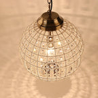 Maison Ornate Adjustable Bronze Crystal Ball Chandelier K9 Vintage Globe with shimmering light effects.