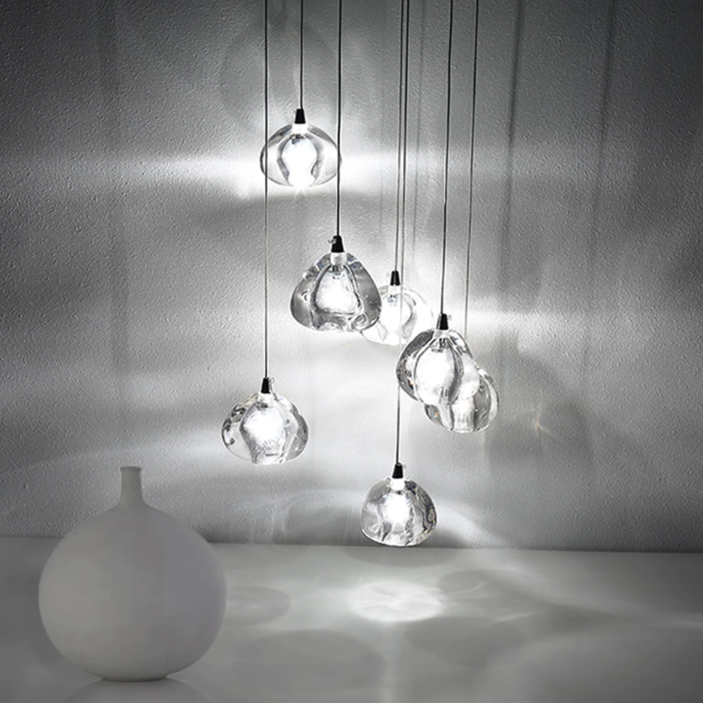 The Maison Ornate Modern LED Crystal Icicle chandelier sparkles softly, showcasing elegant crystal design.
