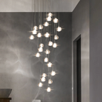 Maison Ornate Modern LED Crystal Icicle chandelier with staggered round glass pendants and artistic reflections.