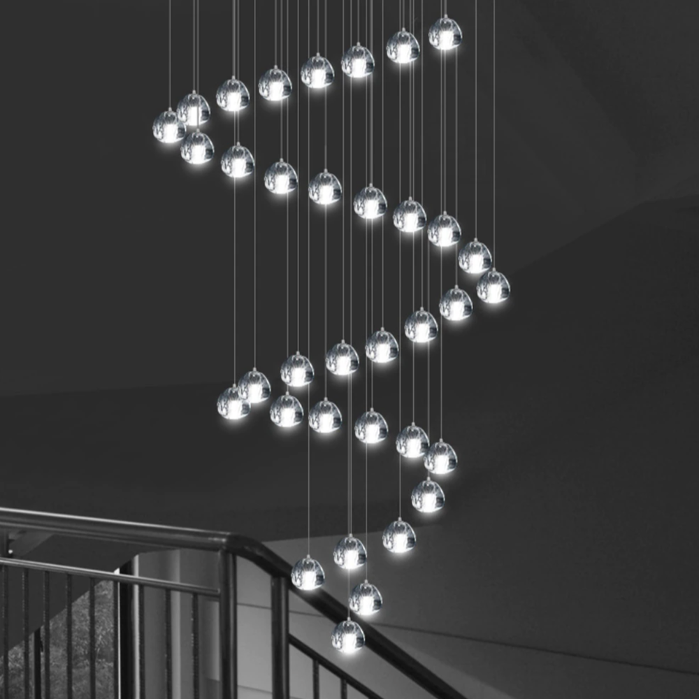 Maison Ornate Modern LED Crystal Icicle chandelier with small round pendants in zigzag pattern.