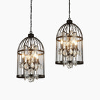 Ornate Art Deco chandelier with black iron cage, glowing E14 bulbs, and hanging crystals.