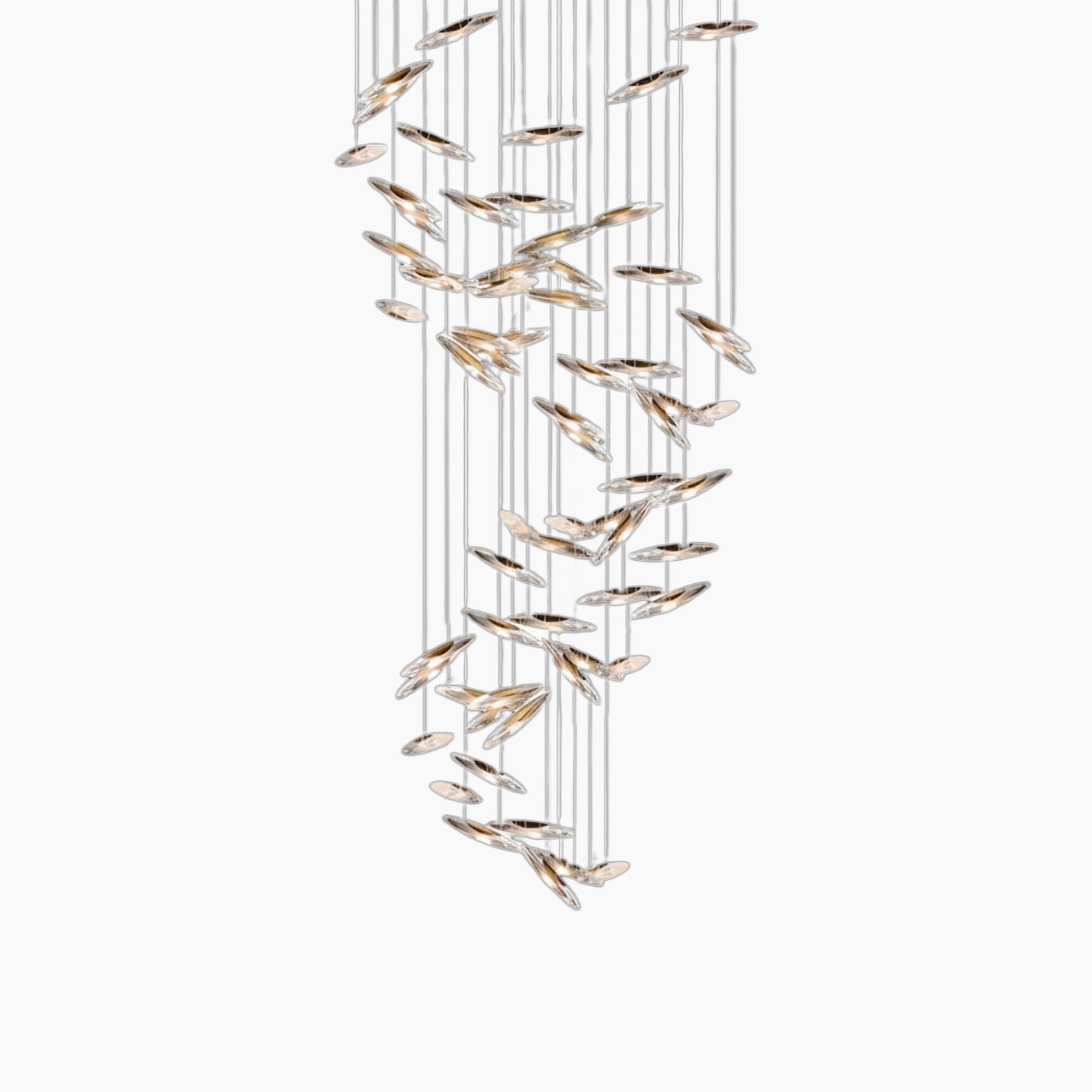 Cascading glass or crystal discs hang at varied heights on thin wires in this modern chandelier.