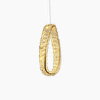 Maison Ornate Modern LED Crystal Glass Chandelier with oval, crystal-textured surface and warm yellow illumination.