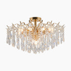 Gold modern chandelier with curved arms and K9 crystal droplets; elegant multi-light design.