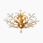 Gold, black, and silver vintage chandelier with K9 crystal teardrops, floral arms, and central gold base.