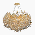 Gold, branch-like chandelier with sparkling crystal drops and LED remote for elegant lighting.