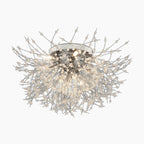 Maison Ornate Modern LED chandelier with silver branches and crystal-tipped bulbs in starburst design.