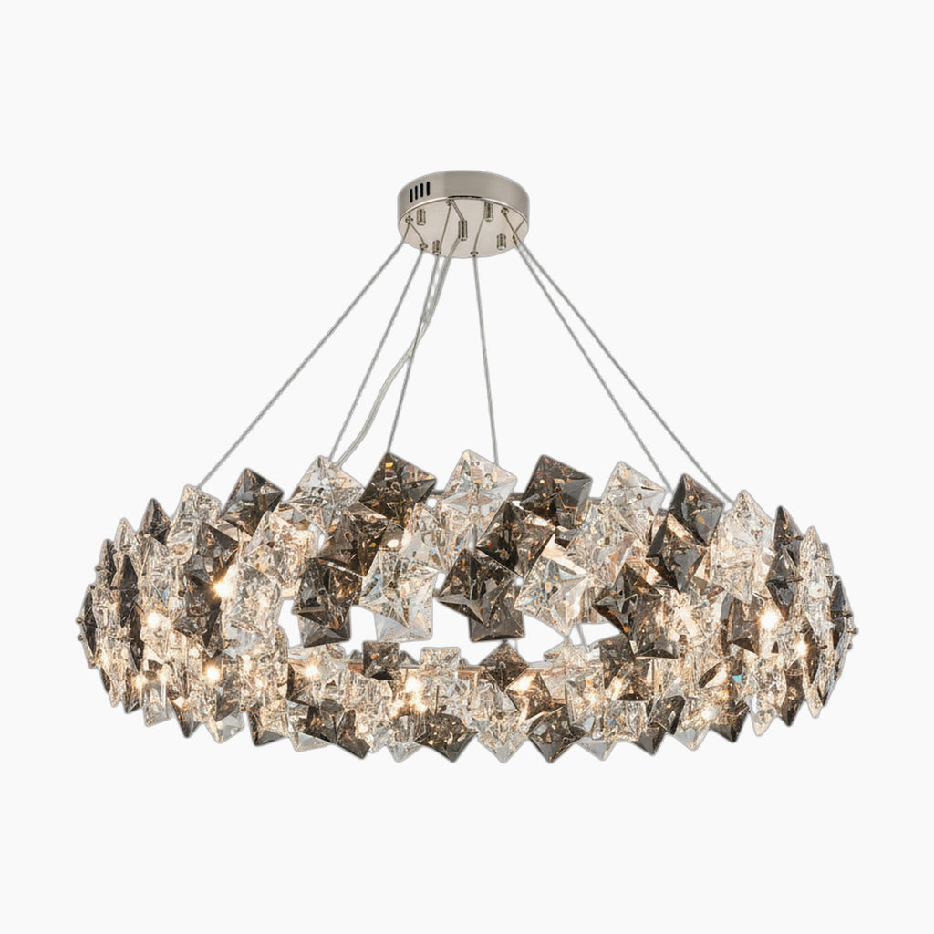 Elegant stainless steel crystal LED chandelier with faceted crystals and four suspension cables.