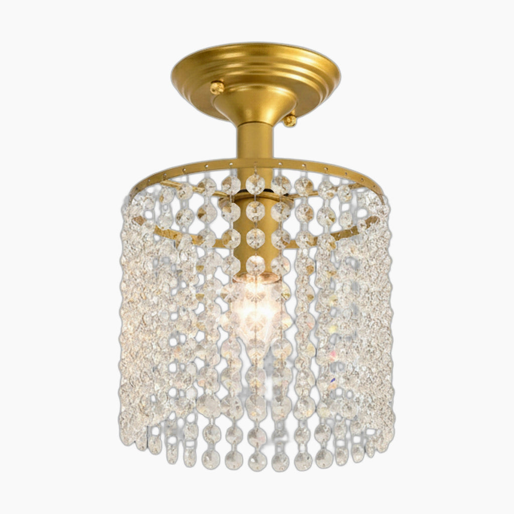 Modern glass and gold chandelier with a single bulb, surrounded by clear crystal bead cylinders.