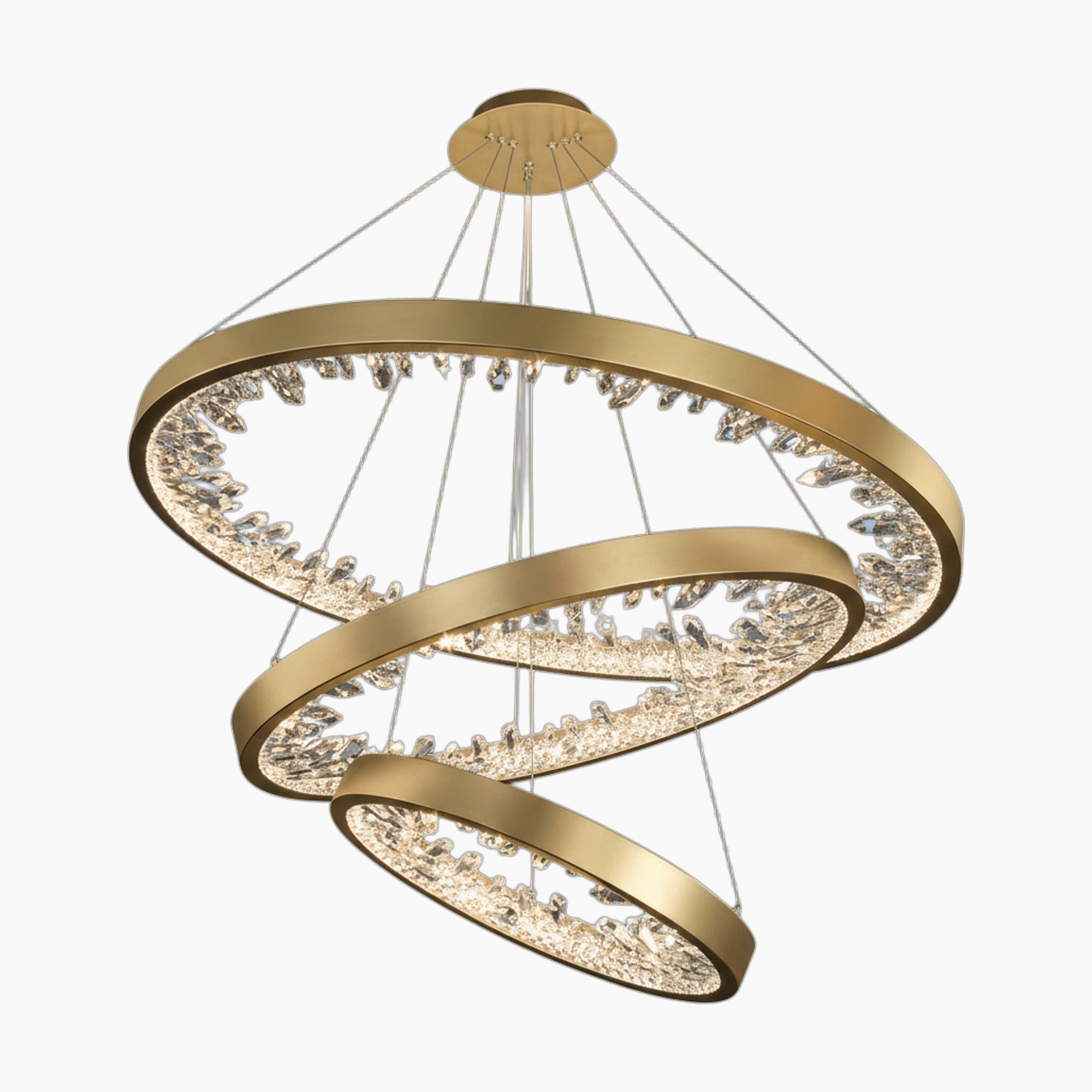 Gold spiral-ring chandelier with sparkling crystals, LED lighting, and dimmable wire suspension. Modern statement piece.