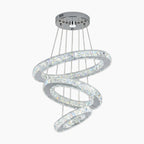 Three crystal-encrusted rings intertwine, suspended by cables from a chrome mount in this Art Deco-inspired chandelier.