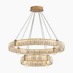 Nordic crystal chandelier with gold LED rings, clear crystals, and four suspension cables.