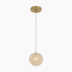 Modern crystal ball chandelier with textured round glass shade, white cord, gold ceiling mount.
